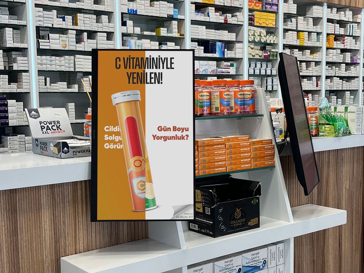 Tezgâh üstünde C vitamini kampanyası gösteren ekran
